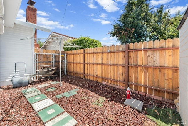 view of yard featuring fence private yard