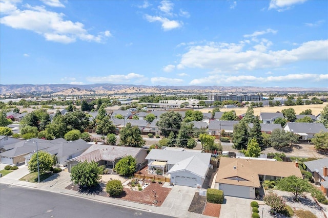 bird's eye view featuring a mountain view and a residential view