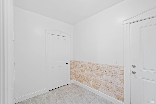 empty room with wooden walls