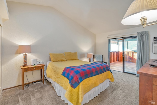 carpeted bedroom featuring vaulted ceiling and access to exterior