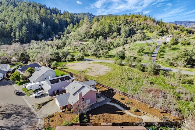 bird's eye view with a forest view