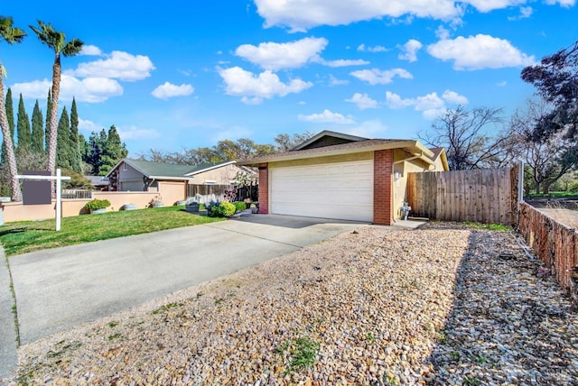 ranch-style house featuring driveway, brick siding, an attached garage, and fence