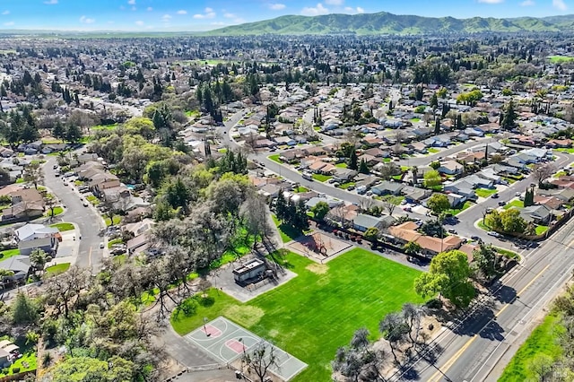 bird's eye view with a residential view and a mountain view