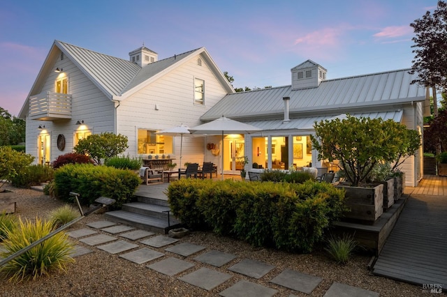 100 W Trinity Rd, Glen Ellen, CA 95442 - rear view of house with a standing seam roof, metal roof, and a balcony