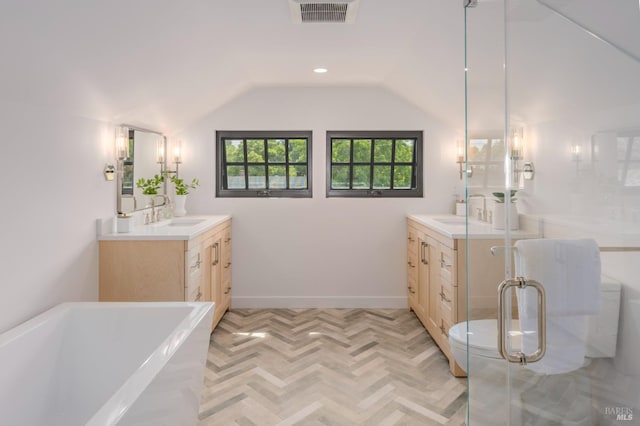 full bath with lofted ceiling, vanity, visible vents, a soaking tub, and a stall shower