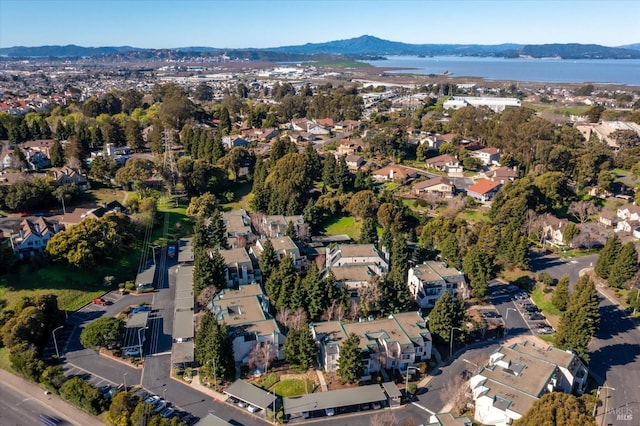 bird's eye view featuring a residential view and a water and mountain view