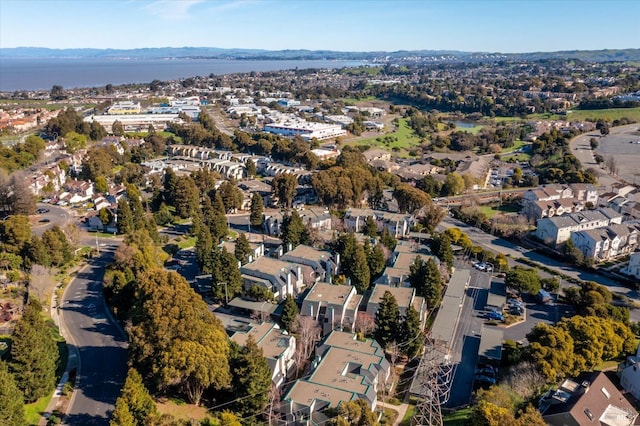 bird's eye view featuring a residential view and a water view