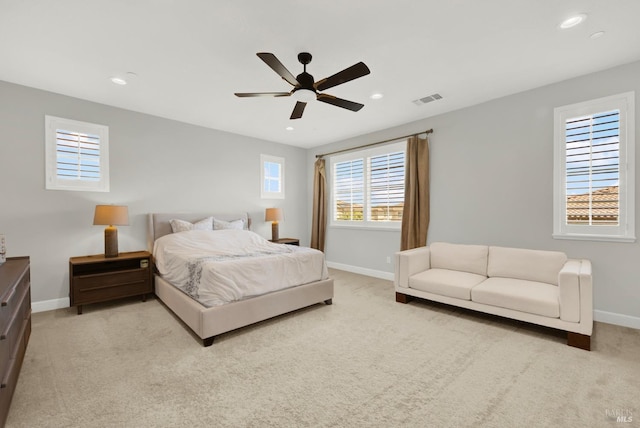 carpeted bedroom with recessed lighting, visible vents, ceiling fan, and baseboards