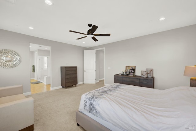 bedroom featuring recessed lighting, a ceiling fan, carpet flooring, ensuite bath, and baseboards