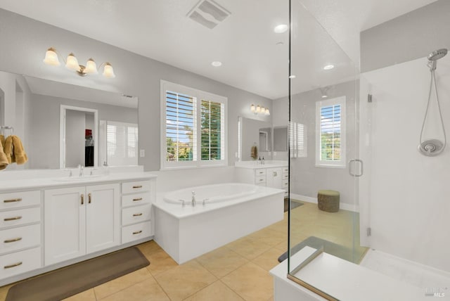 full bathroom with a stall shower, visible vents, tile patterned floors, a sink, and a bath