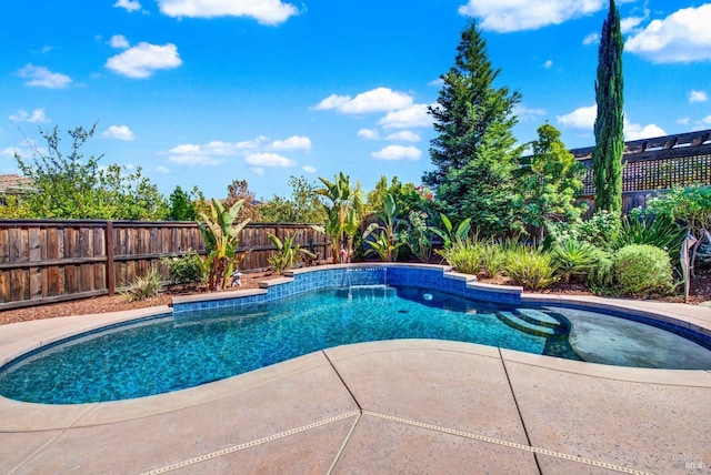 view of swimming pool featuring a fenced in pool, a patio area, and a fenced backyard