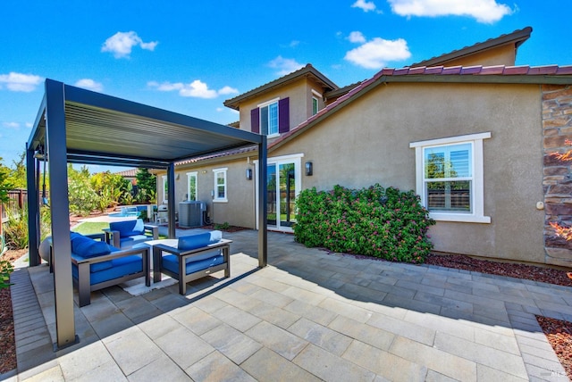 view of patio with central AC and outdoor lounge area