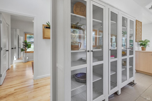 room details featuring wood finished floors and baseboards