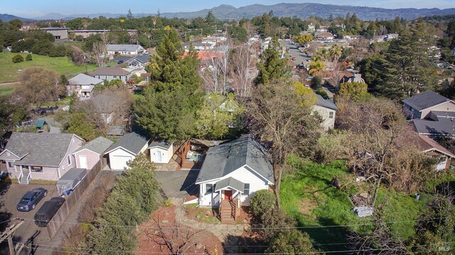 drone / aerial view with a residential view and a mountain view