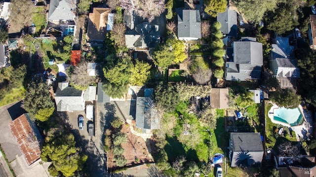 birds eye view of property with a residential view