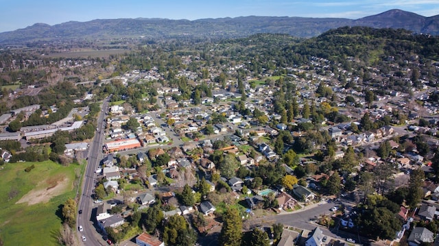 drone / aerial view with a residential view and a mountain view