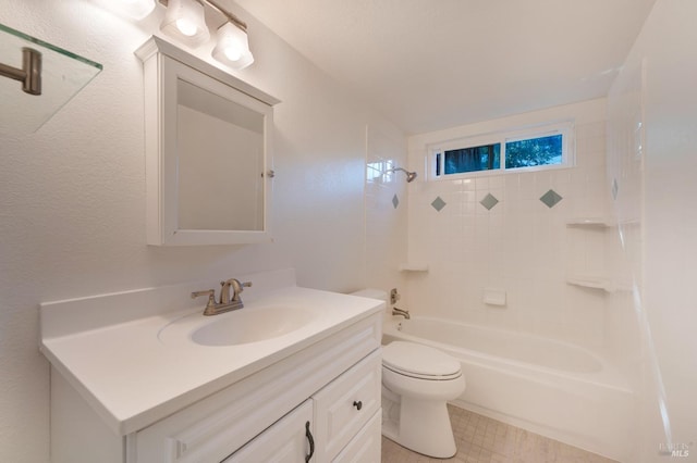 full bathroom with a textured wall, tub / shower combination, vanity, and toilet