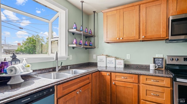 kitchen featuring brown cabinets, open shelves, stainless steel appliances, and a sink