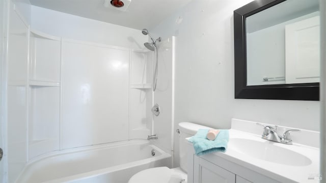 bathroom with bathing tub / shower combination, toilet, and vanity