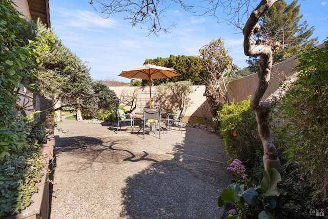 view of patio with a fenced backyard