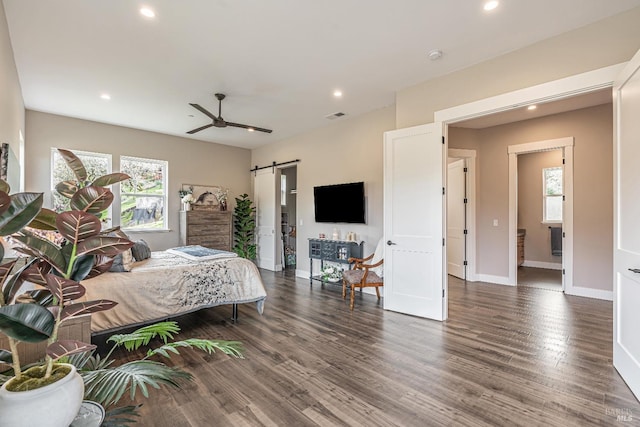 dining space featuring dark wood-type flooring and recessed lighting
