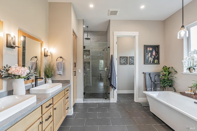 bathroom with baseboards and a freestanding bath