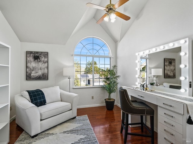 office with a wealth of natural light, a ceiling fan, baseboards, and dark wood-style flooring