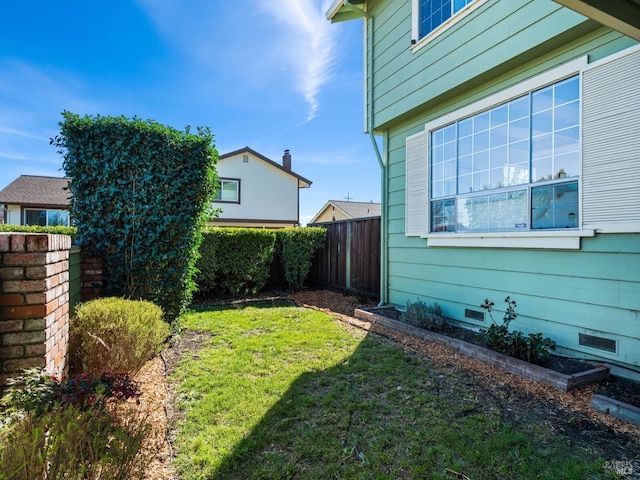 view of yard featuring fence