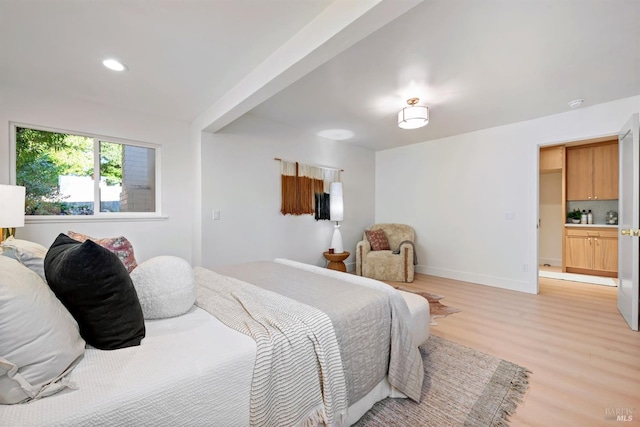 bedroom featuring baseboards, recessed lighting, and light wood-style floors