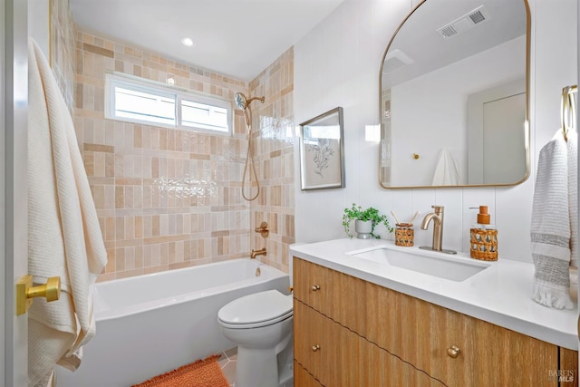 full bathroom featuring  shower combination, visible vents, vanity, and toilet