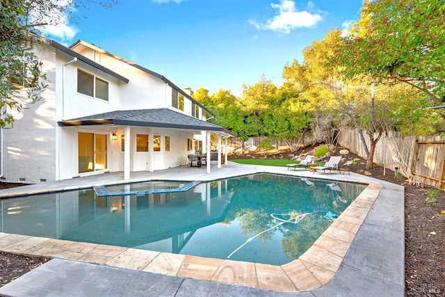 view of swimming pool with a fenced in pool, a fenced backyard, and a patio