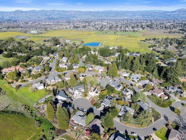 birds eye view of property featuring a residential view and a mountain view