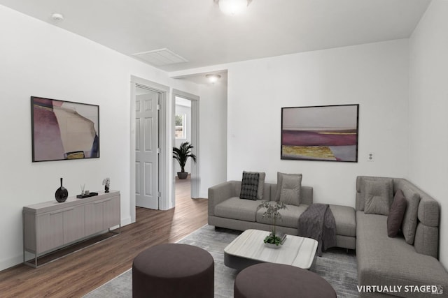 living area featuring wood finished floors