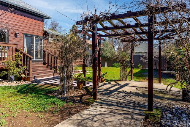 exterior space featuring a patio area and a pergola