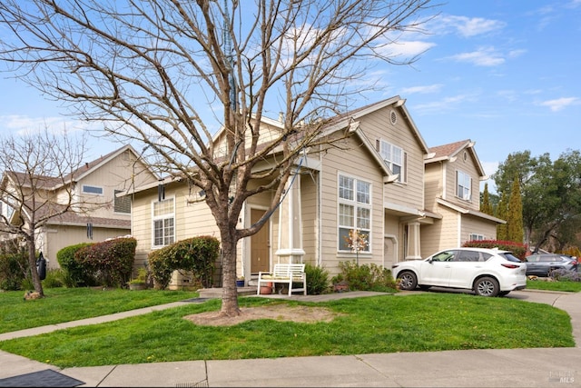 view of front of home with a front lawn