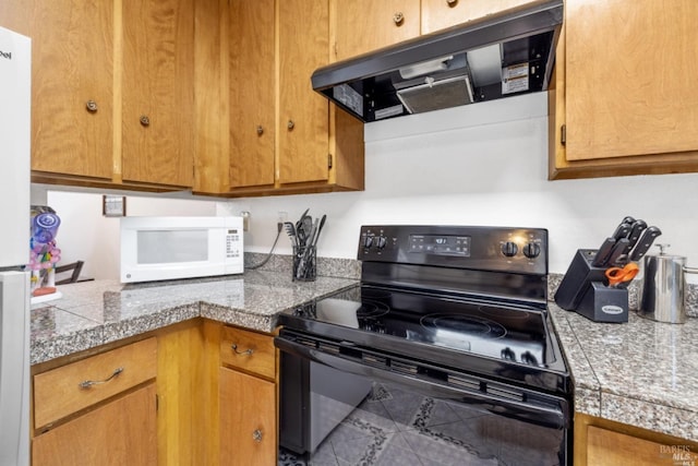 kitchen with white appliances, tile counters, brown cabinets, and exhaust hood