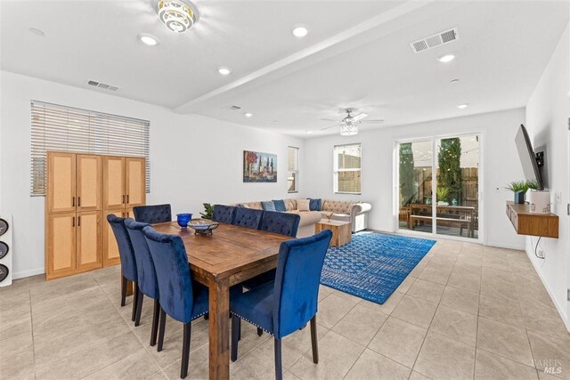 dining room featuring light tile patterned flooring, baseboards, visible vents, and recessed lighting