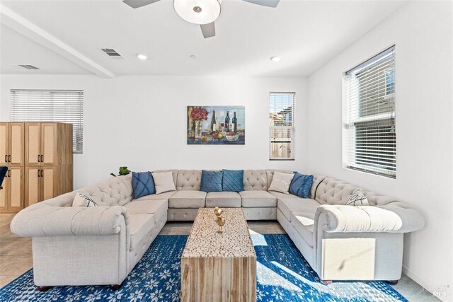 living area with visible vents, a ceiling fan, and recessed lighting