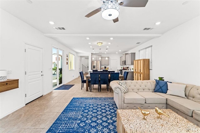 living room with visible vents, ceiling fan, recessed lighting, and light tile patterned flooring