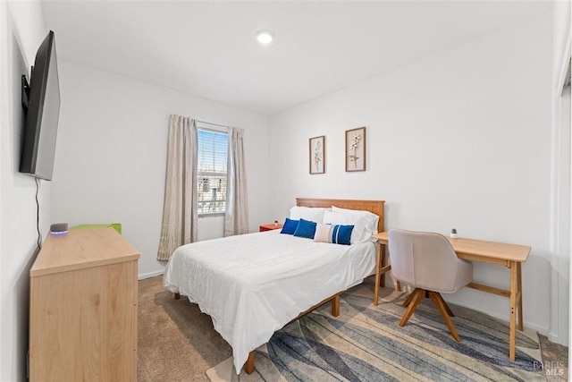 bedroom featuring recessed lighting, carpet, and baseboards