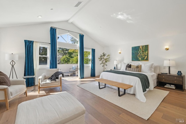 bedroom with high vaulted ceiling, hardwood / wood-style floors, beamed ceiling, and visible vents