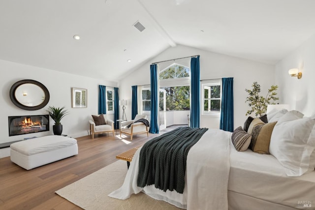 1211 Grand Ave, San Rafael, CA 94901 - bedroom featuring wood finished floors, a glass covered fireplace, access to exterior, recessed lighting, and baseboards