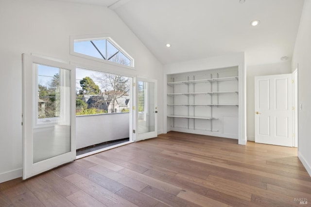 1211 Grand Ave, San Rafael, CA 94901 - unfurnished room featuring hardwood / wood-style flooring, built in shelves, baseboards, high vaulted ceiling, and recessed lighting
