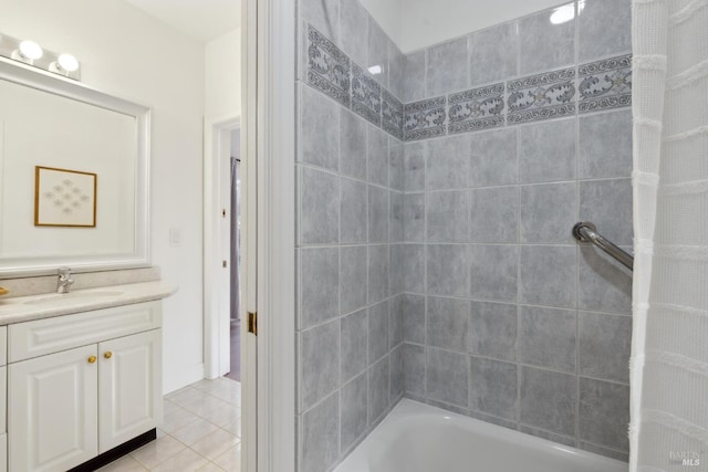 full bath with shower / tub combo, tile patterned flooring, and vanity