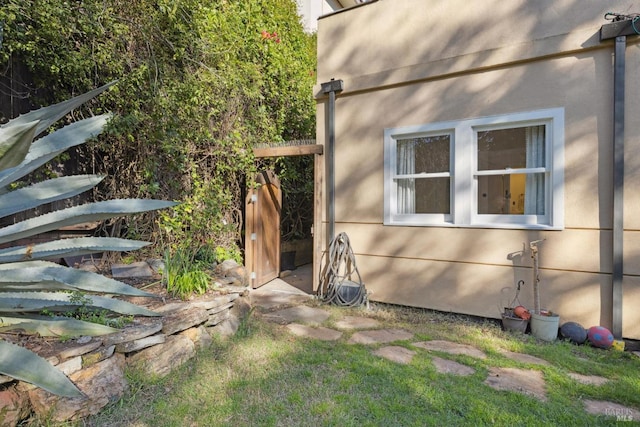 view of home's exterior with stucco siding