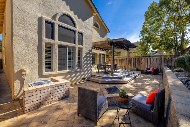 view of patio / terrace with fence, a pergola, outdoor dining area, and an outdoor living space with a fire pit