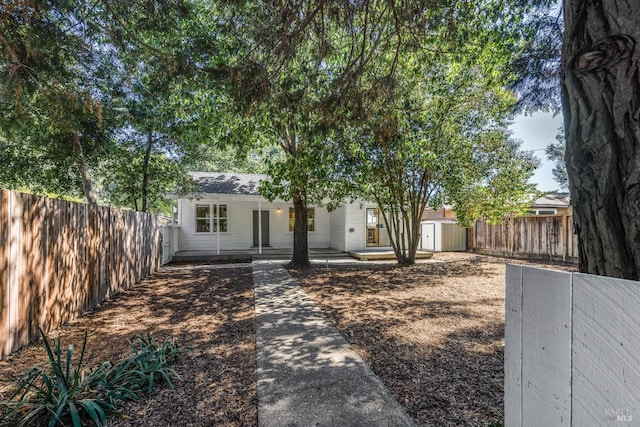 view of front of property with a fenced backyard