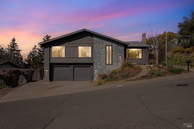 view of front of house featuring driveway and an attached garage