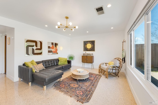 living room with recessed lighting, visible vents, an inviting chandelier, baseboards, and speckled floor