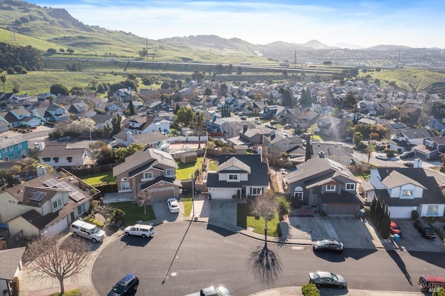 bird's eye view with a residential view and a mountain view